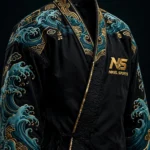 embroidered bjj gi black ocean wave front view teal gold tsunami waves full sleeves gold NS logo collar