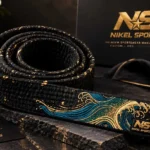 custom embroidered black belt teal gold ocean wave lifestyle premium view gold galaxy splatter teal wave embroidery NS logo